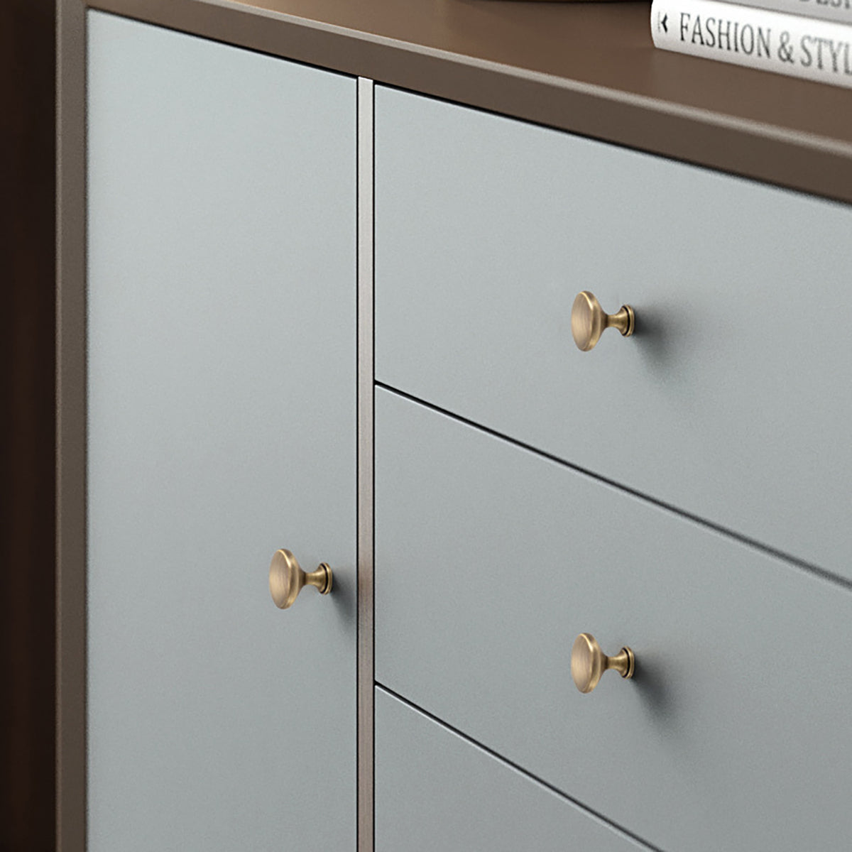 Domed mushroom brass cabinet knob with brushed bronze finish, style #9 (20 mm option) installed on furniture.