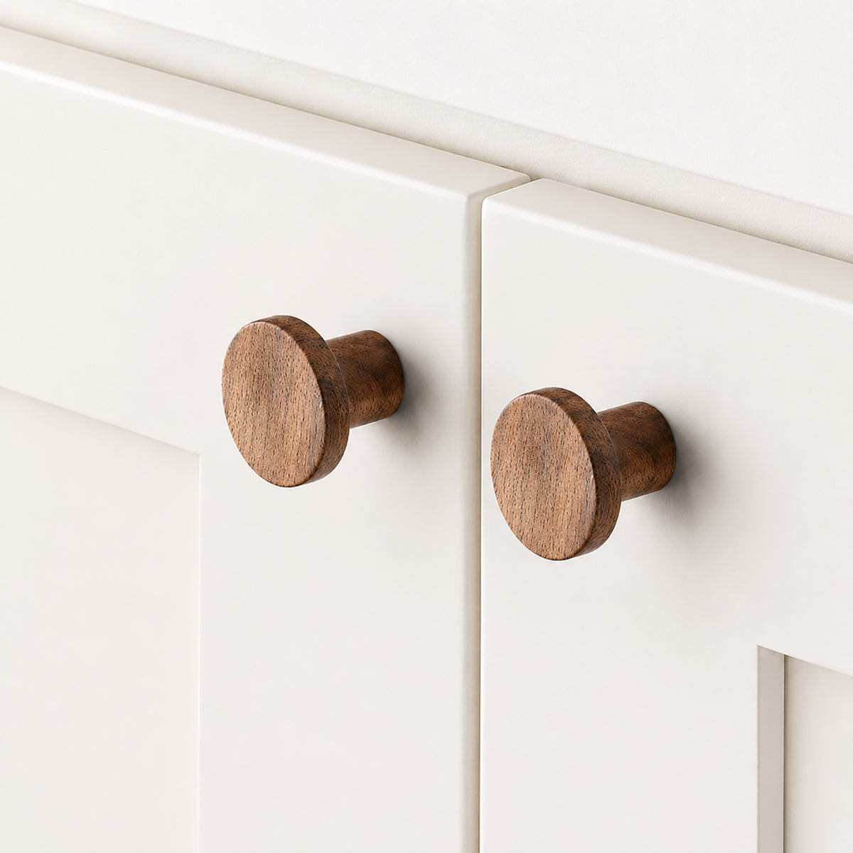 Cylindrical round walnut cabinet knob, style #9 shown in a styled setting.