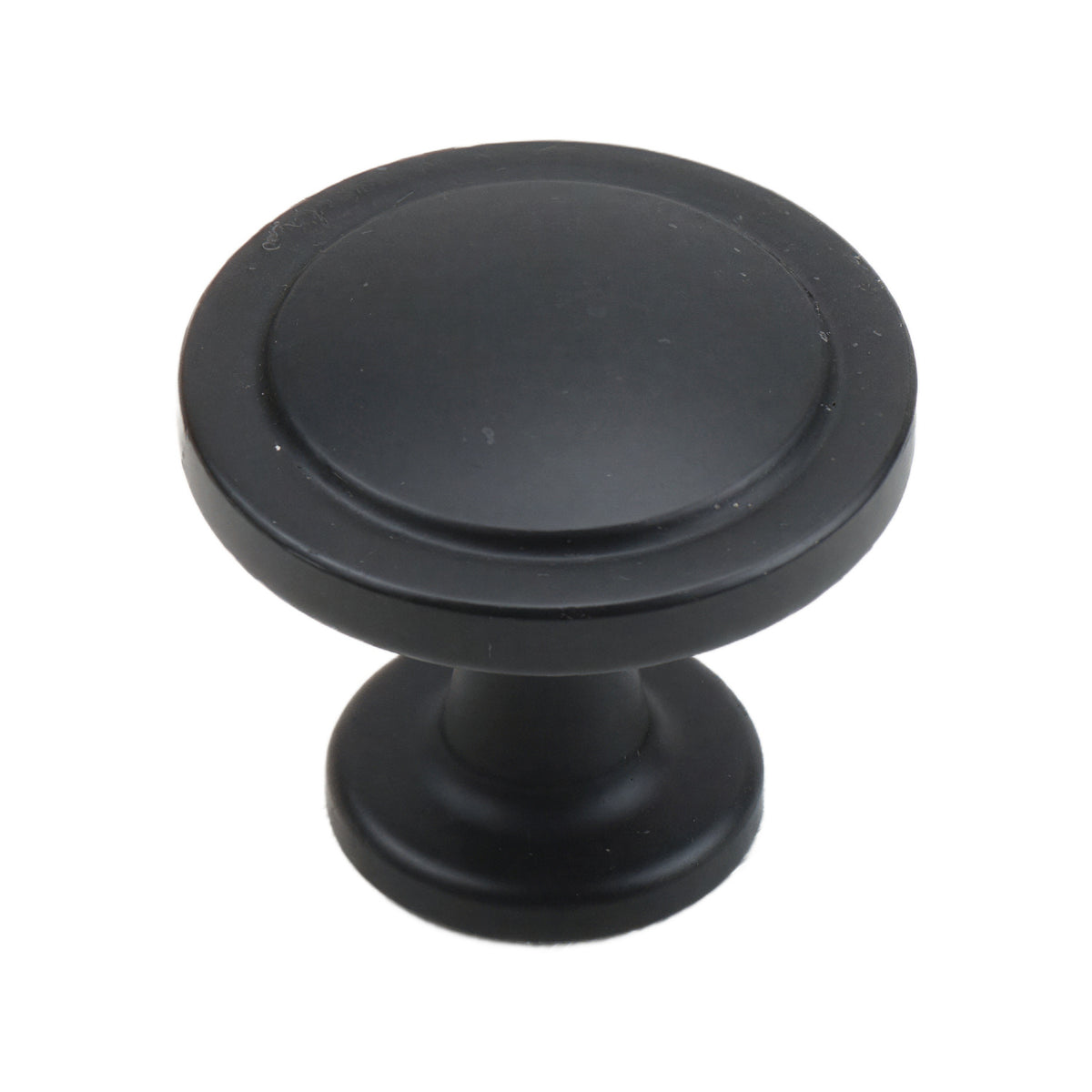 Black round cabinet knob with a flat circular center, option No. 3.