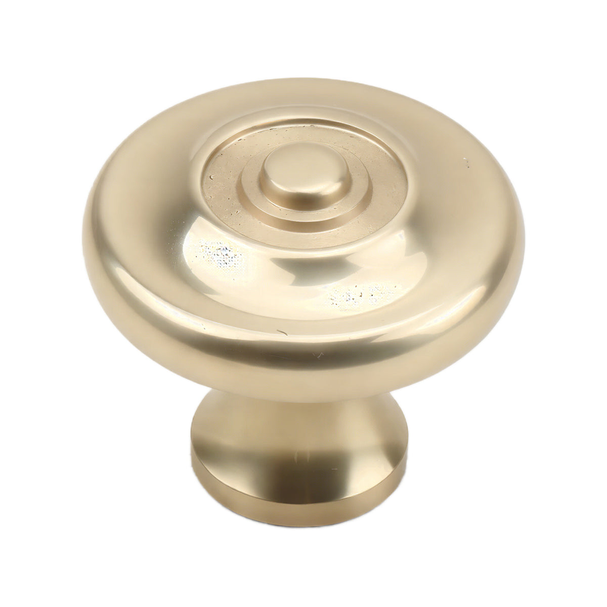 Gold-tone round cabinet knob with concentric rings and a raised center, option No. 1.