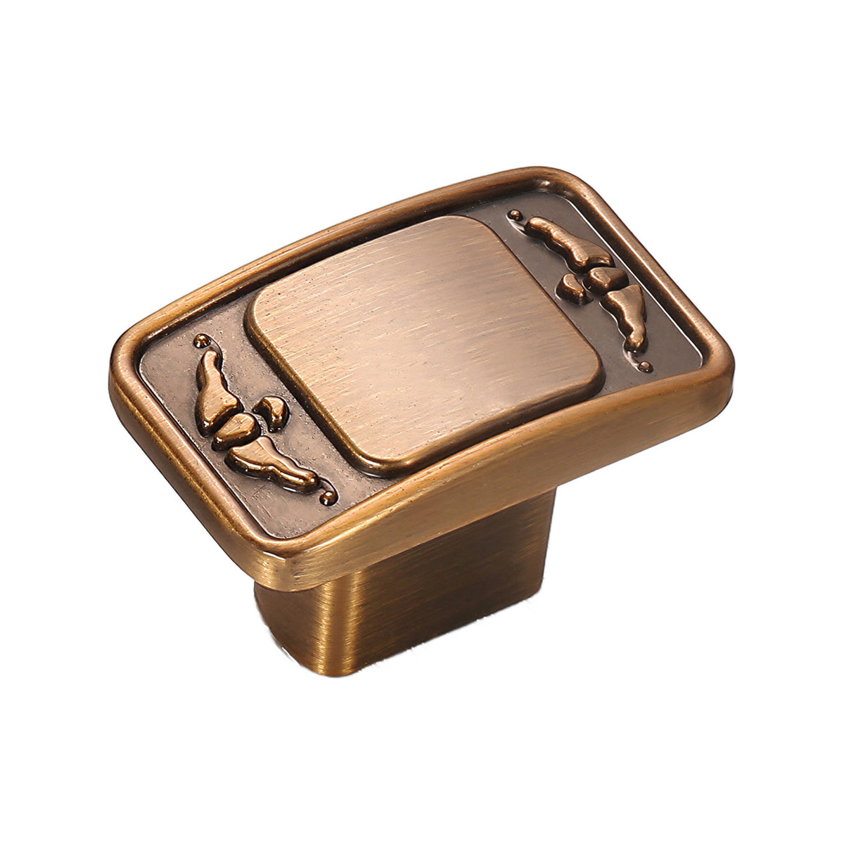 Rectangular cabinet knob with a raised center panel and small scroll accents, variant #5.