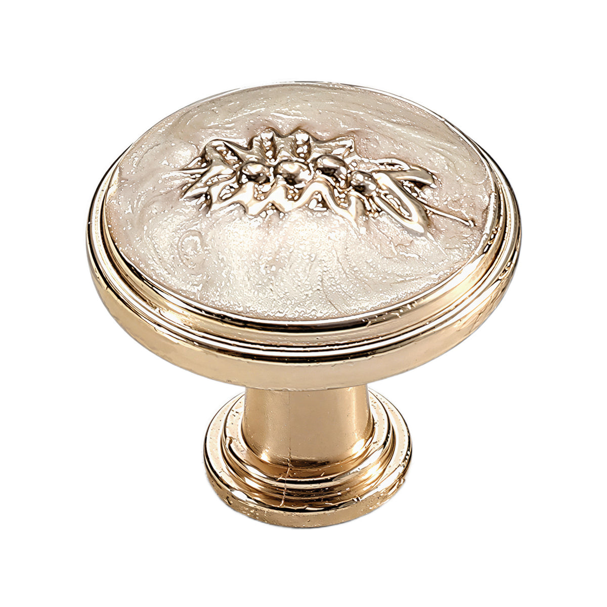Gold-tone round cabinet knob with a floral sprig on a light textured face, option #2.