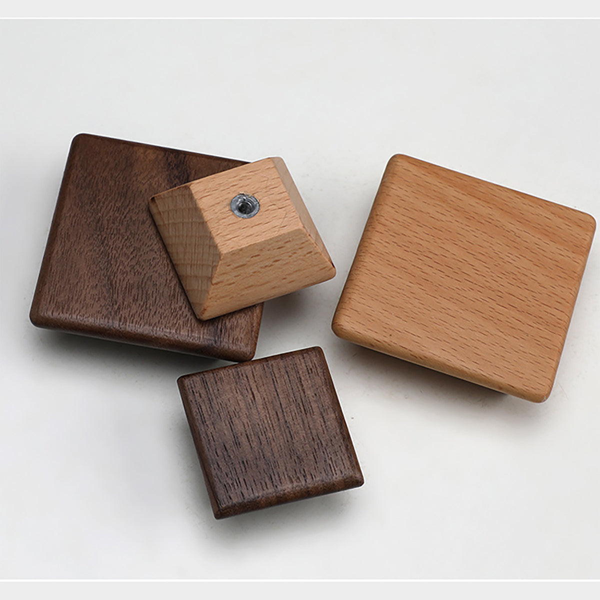 Square beech and walnut wood cabinet knobs shown from front and back.
