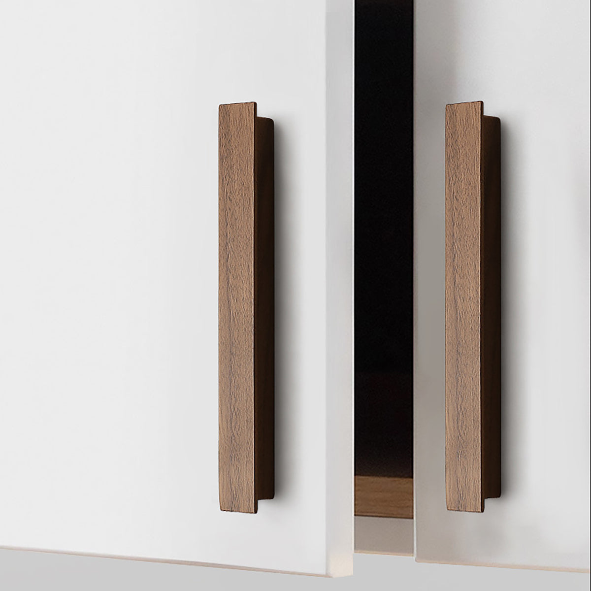 Walnut wood cabinet finger pull, style #1 (160 mm option) fitted to cabinetry.