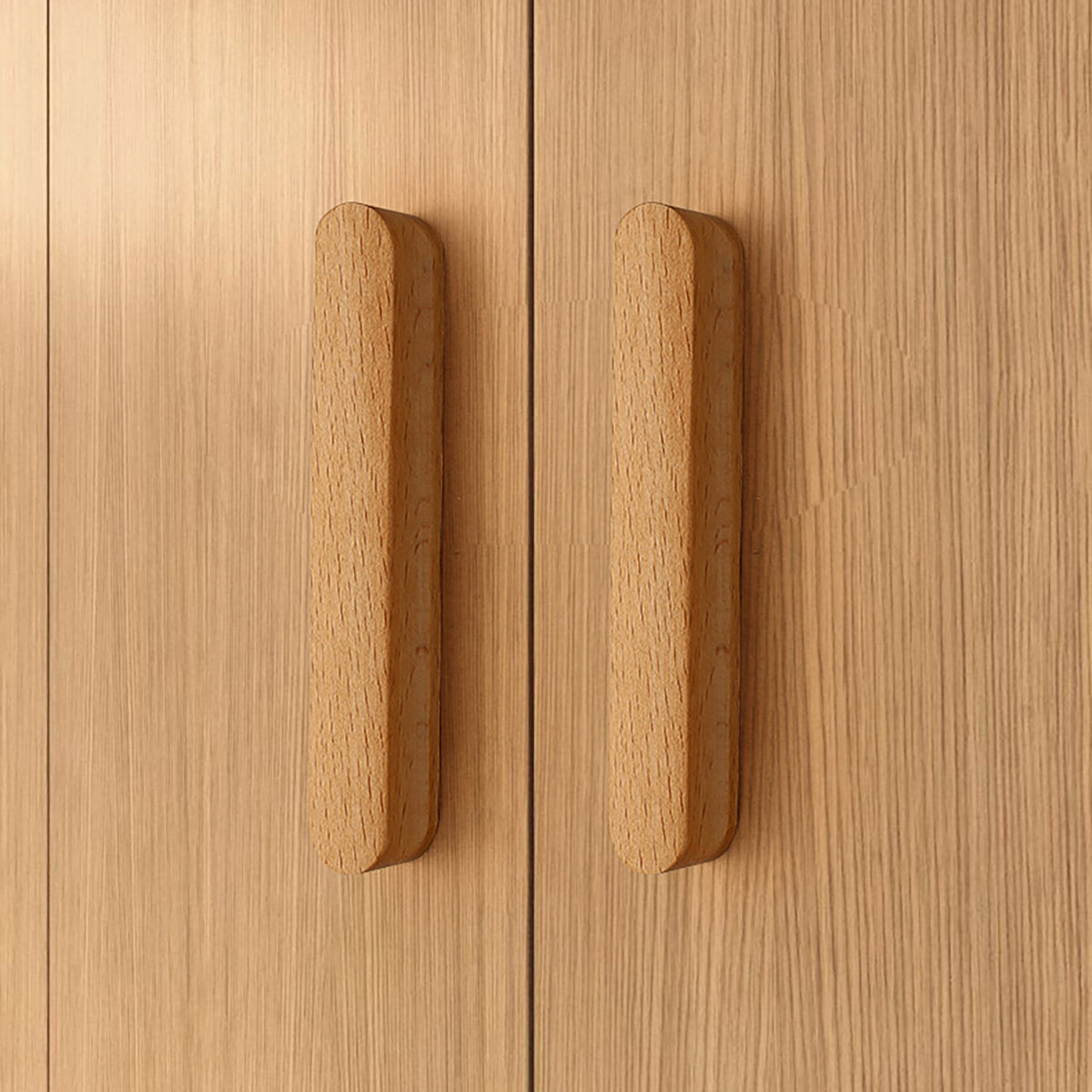 Beech wood finger pulls installed vertically and horizontally on a cabinet.