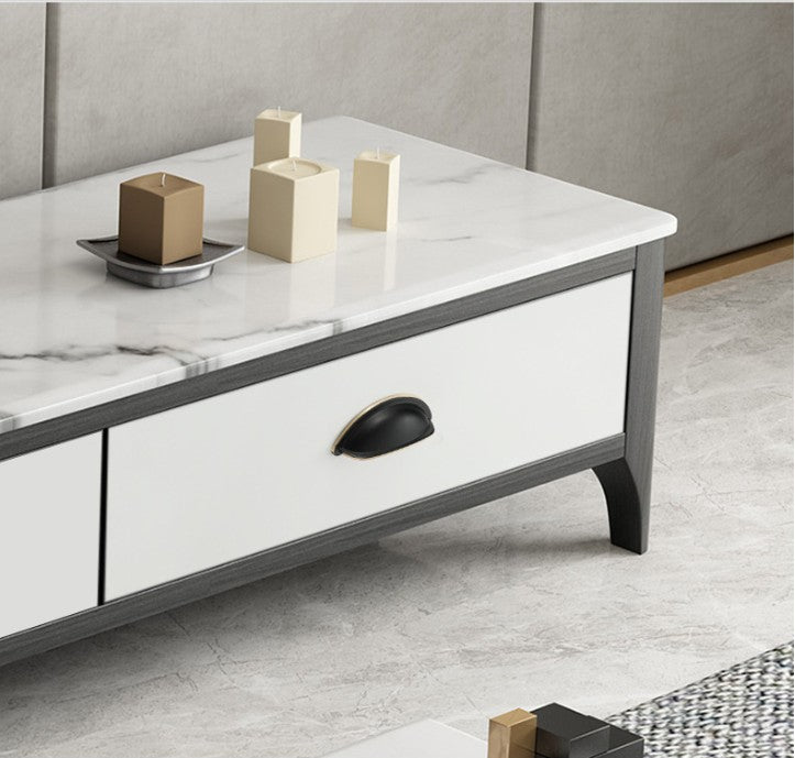Solid brass open-back cup pull in Blackened Bronze shown on a white drawer with a dark frame.