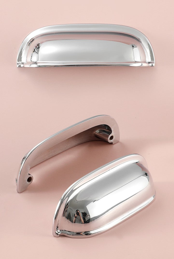Front, rear and angled views of the solid brass rounded dome cup pull in Polished Chrome.