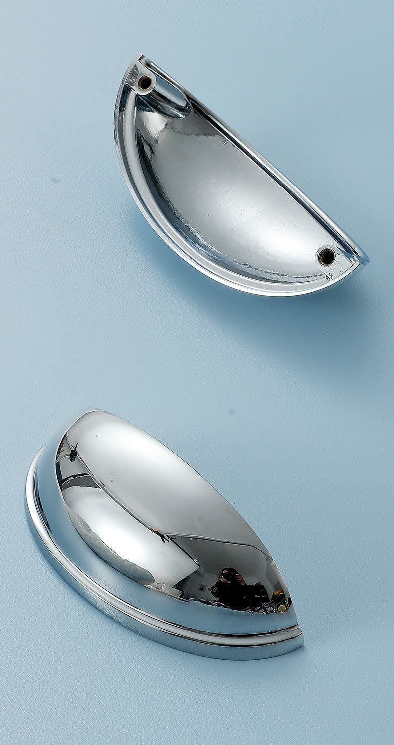 Two polished chrome half-moon cup pulls showing the curved front and underside with mounting holes.
