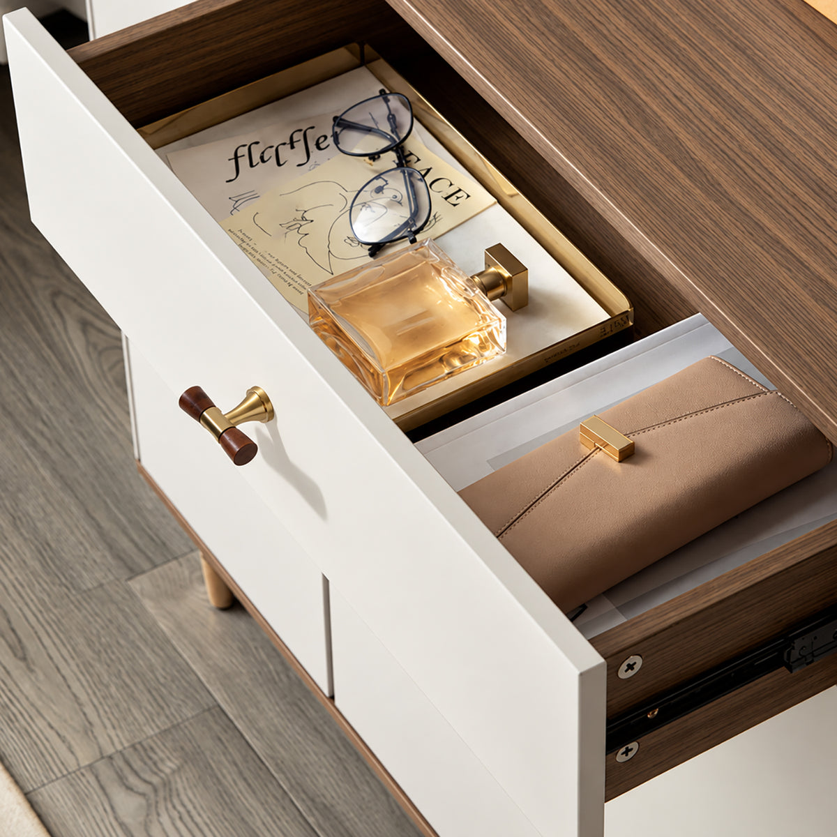 In-use view of dark wood-ended brass T-bar cabinet pull, style #6 Brass.